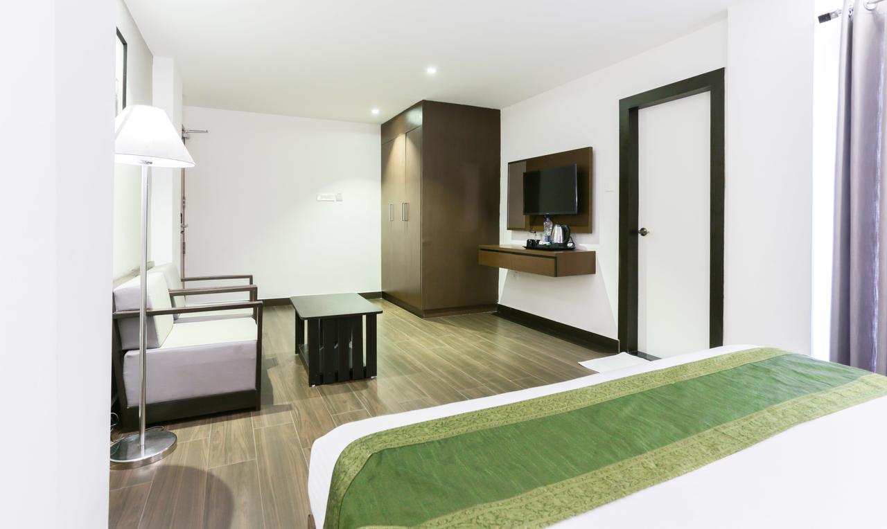 Hotel Crown Suites Коччи Экстерьер фото
